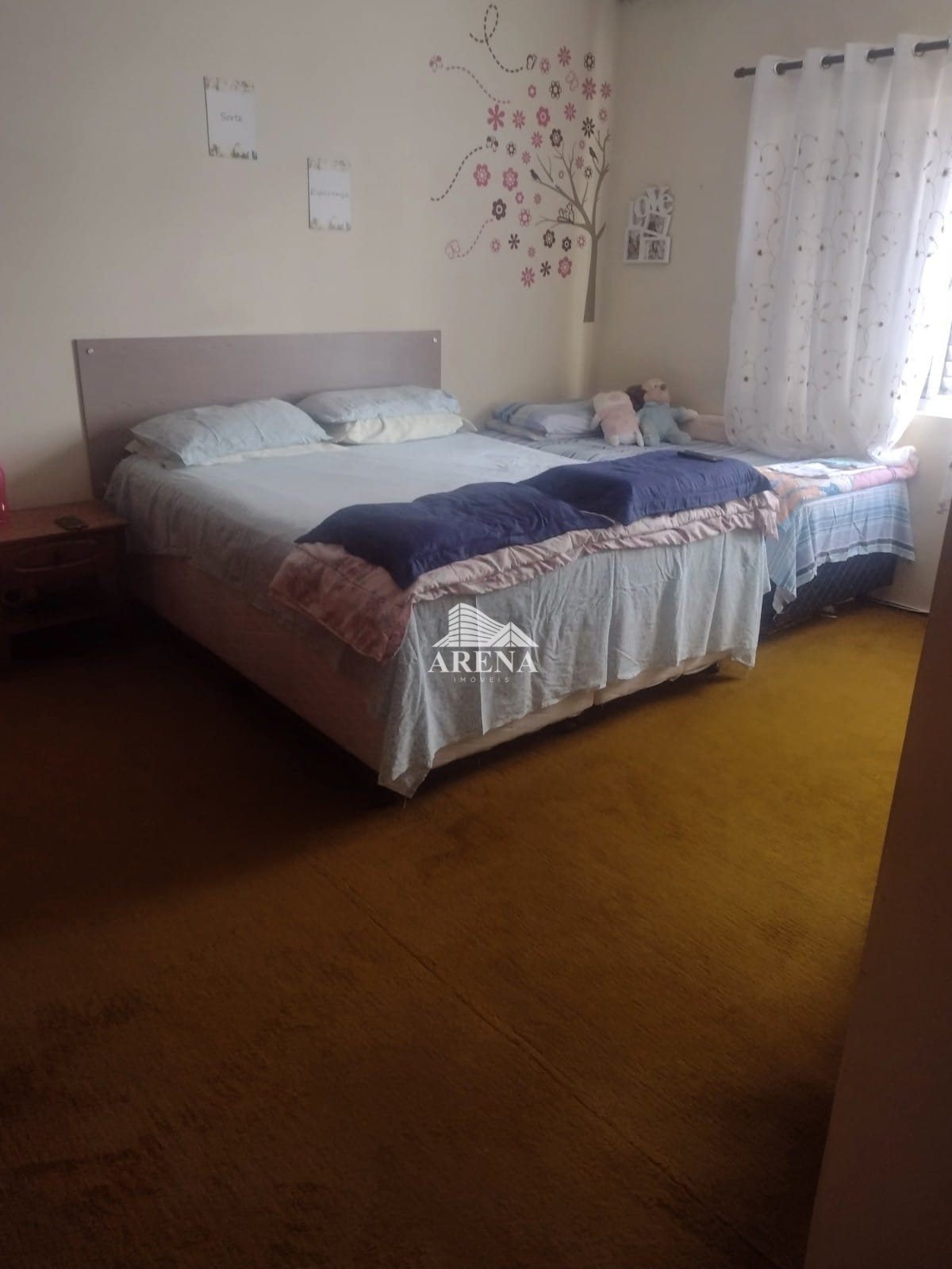 Sobrado com 3 dormitórios no Bairro Sta Maria mais casa com 2 dormitórios nos fundos.