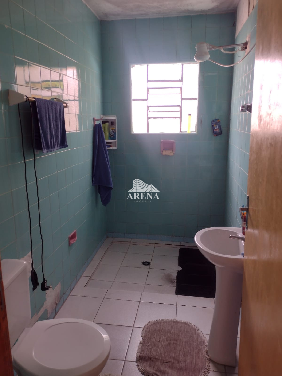 Sobrado com 3 dormitórios no Bairro Sta Maria mais casa com 2 dormitórios nos fundos.